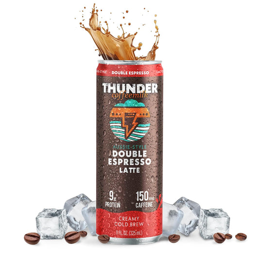 Thunder CoffeeMilk Double Espresso Latte can with a coffee splash pouring out, on ice with coffee beans, 9g protein and 150mg caffeine