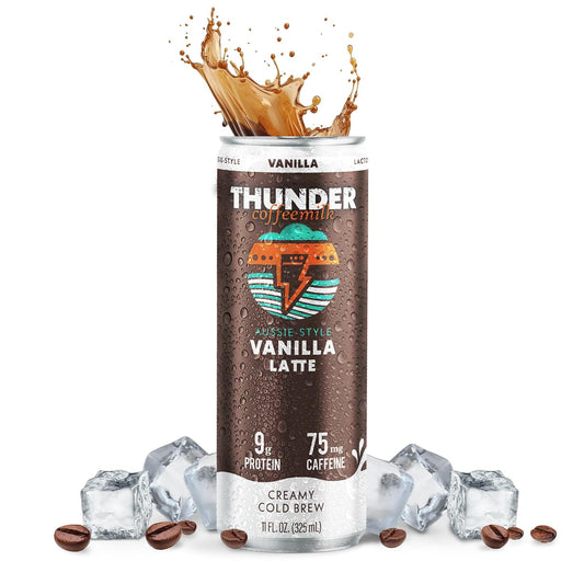 Thunder CoffeeMilk Vanilla Latte can with a creamy coffee splash, on ice with coffee beans, 9g protein and 75mg caffeine